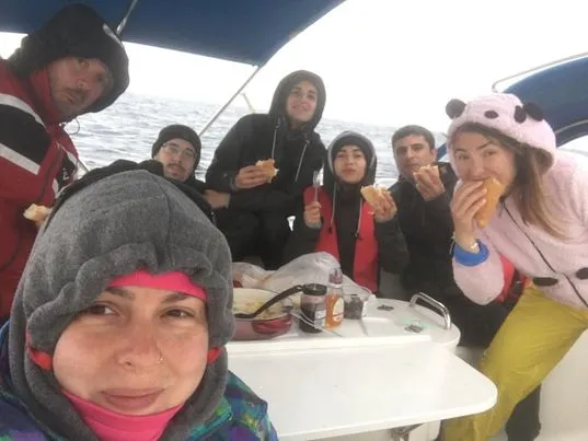 Smiles on stormy seas